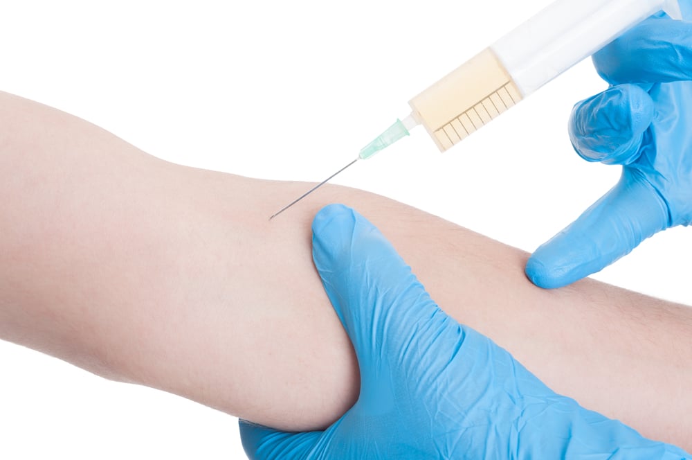 Someone receiving a testosterone injection. Testosterone cypionate injections are generally the best method of testosterone replacement therapy. Learn more.